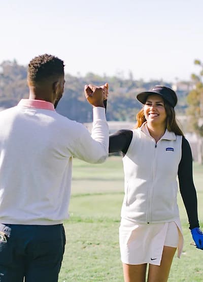Golfers high-fiving