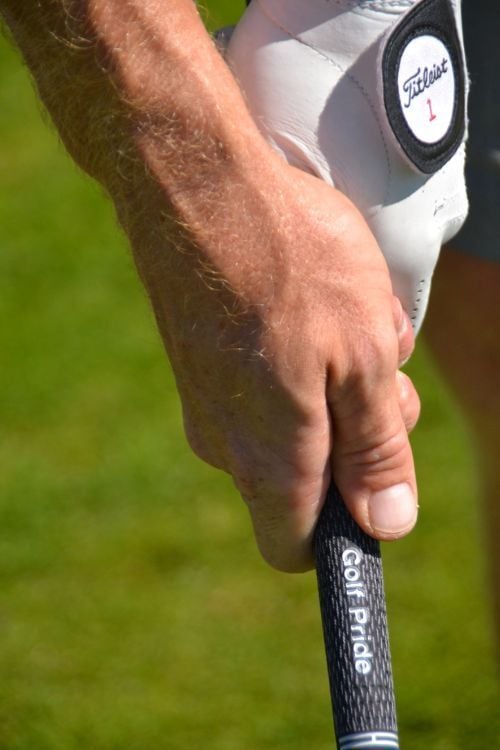 IMAGE 2 The neutral grip; the right thumb at 11 oclock, the left thumb at 2 oclock.