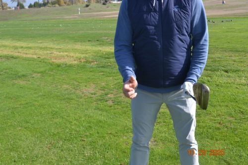 IMAGE 4 Wrists raised in front. (The degree of flex in the backswing and to impact is indicated here)