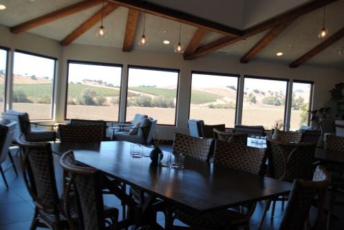 Tasting room overlooking the vineyards at Talley Winery